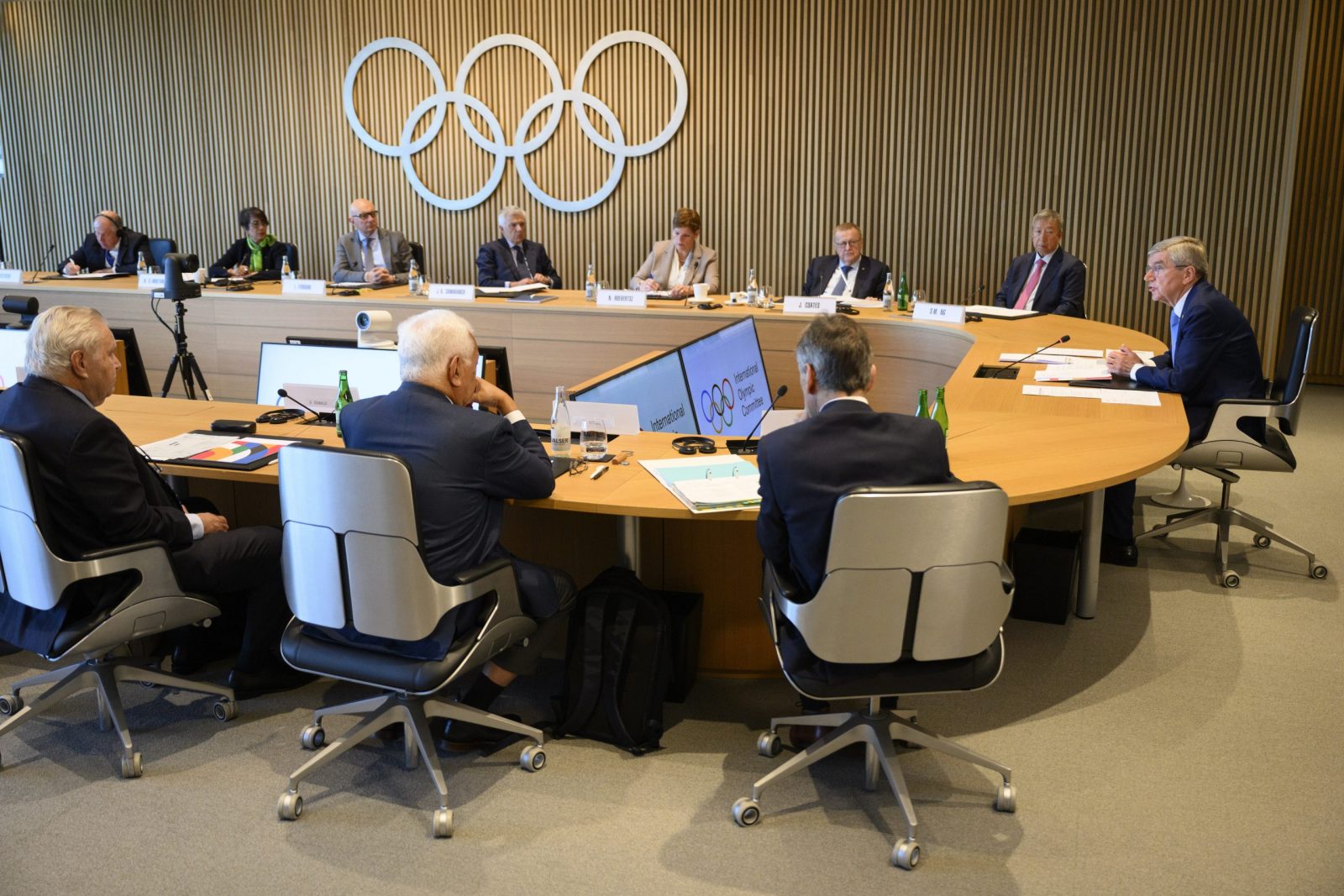 epa10546653 International Olympic Committee (IOC) President Thomas Bach (R) speaks at the opening of the executive board meeting of the International Olympic Committee (IOC), at the Olympic House, in Lausanne, Switzerland, 28 March 2023. The International Olympic Committee (IOC) Executive Board is set to discuss the results of consultations regarding the status of athletes from Russia and Belarus in its meeting set to run until March 30.  EPA/LAURENT GILLIERON