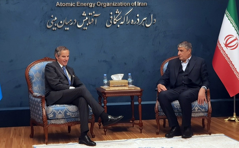 epa10500761 A handout picture made available by Iran Atomic Energy Organisation office (aeoi) shows, the Head of Iran Atomic Energy Organization Mohammad Eslami (R) talks with Director General of the International Atomic Energy Agency (IAEA) Rafael Mariano Grossi (L), in Tehran, Iran, 03 March 2023. Grossi is in Tehran to meet with Iranian officials over Iran's dispute nuclear programm.  EPA/AEOI /HANDOUT  HANDOUT EDITORIAL USE ONLY/NO SALES