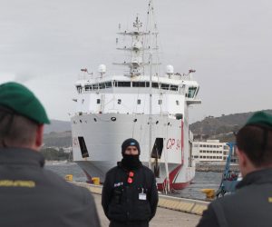 epa10514745 The Diciotti offshore patrol vessel carrying 584 migrants rescued at sea docks at a port in Reggio Calabria, southern Italy, 11 March 2023.  EPA/MARCO COSTANTINO