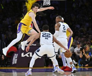 Apr 28, 2023; Los Angeles, California, USA; Los Angeles Lakers guard Austin Reaves (15) defends Memphis Grizzlies guard Desmond Bane (22) in the first half of game six of the 2023 NBA playoffs at Crypto.com Arena. Mandatory Credit: Jayne Kamin-Oncea-USA TODAY Sports