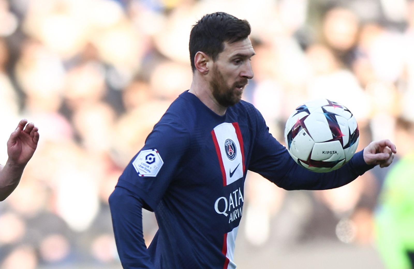 epa10532441 Paris Saint Germain's Lionel Messi (R) and Benjamin Bourigeaud of Rennes in action during the French Ligue 1 soccer match between Paris Saint Germain and Stades Rennais FC in Paris, France, 19 March 2023.  EPA/MOHAMMED BADRA