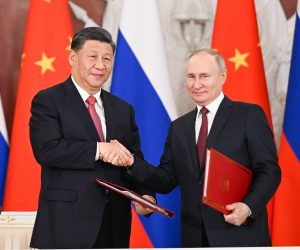 epa10536292 Chinese President Xi Jinping and Russian President Vladimir Putin shake hands after jointly signing a Joint Statement of the People's Republic of China and the Russian Federation on 'Deepening the Comprehensive Strategic Partnership of Coordination for the New Era' and a Joint Statement of the President of the People's Republic of China and the President of the Russian Federation on 'Pre-2030 Development Plan on Priorities in China-Russia Economic Cooperation' in Moscow, Russia, 21 March 2023 (issued 22 March 2023). Xi held talks with Putin at the Kremlin in Moscow.  EPA/XINHUA / Xie Huanchi CHINA OUT / MANDATORY CREDIT  EDITORIAL USE ONLY