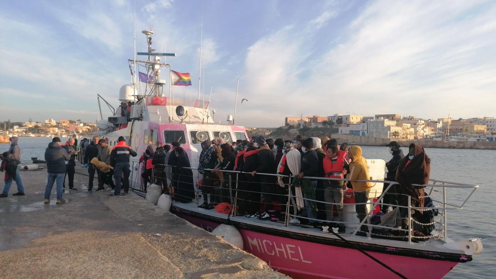 epa10543914 The rescue ship Louise Michel from the namesake NGO, financed by street-artist Banksy, is moored at the port of Lampedusa, Sicily, 26 March 2023. Activists aboard the ship, currently carrying around 180 migrants rescued at sea, denounced on 26 March that they were being prevented to go back at sea but that no official explanation had yet been given by Italian authorities.  EPA/ELIO DESIDERIO