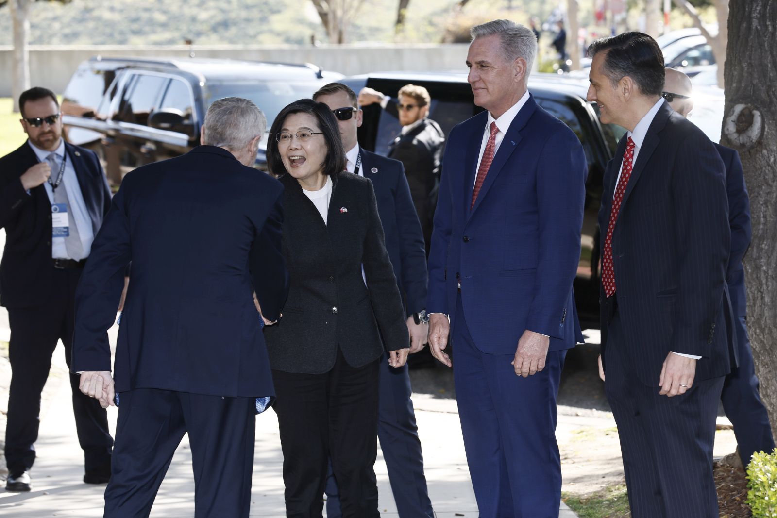 epa10560106 US Speaker of the House Kevin McCarthy (2R) greets President Tsai Ing-wen of Taiwan (2L) on arrival for a meeting at the Ronald Reagan Presidential Library in Simi Valley, California, USA, 05 April 2023. Tsai's visit was a stop on her way home from a visit to Latin America.  EPA/ETIENNE LAURENT