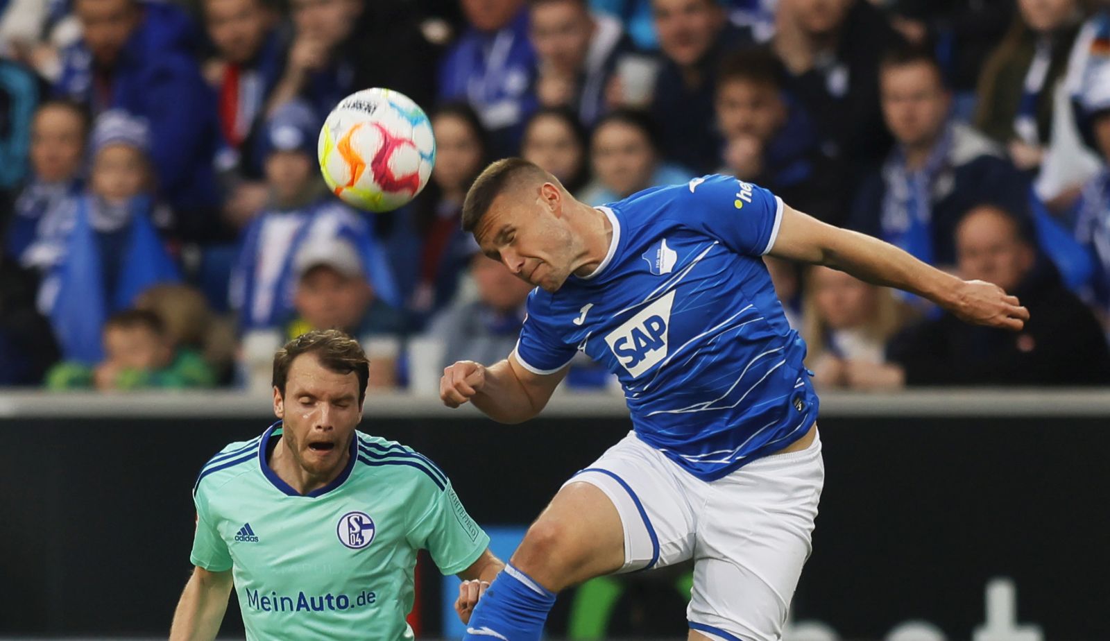 epa10566595 Hoffenheim's Pavel Kaderabek (R) in action against Schalke's Thomas Ouwejan (L) during the German Bundesliga soccer match between TSG 1899 Hoffenheim and FC Schalke 04 in Sinsheim, Germany, 09 April 2023.  EPA/RONALD WITTEK CONDITIONS - ATTENTION: The DFL regulations prohibit any use of photographs as image sequences and/or quasi-video.