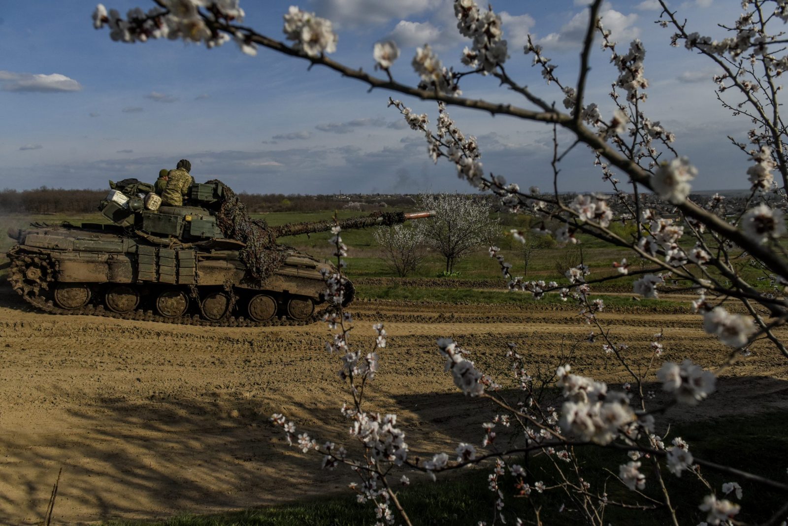 epa10567790 A tank moves on the road,  at undisclosed location near Bakhmut,  Donetsk region, Ukraine, 10 April 2023. Russian troops entered Ukrainian territory on 24 February 2022, starting a conflict that has provoked destruction and a humanitarian crisis.  EPA/OLEG PETRASYUK
