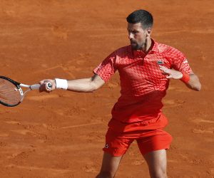 epa10568444 Novak Djokovic of Serbia returns the ball to Ivan Gakhov during their first round match at the Monte-Carlo Rolex Masters tournament in Roquebrune Cap Martin, France, 11 April 2023.  EPA/SEBASTIEN NOGIER