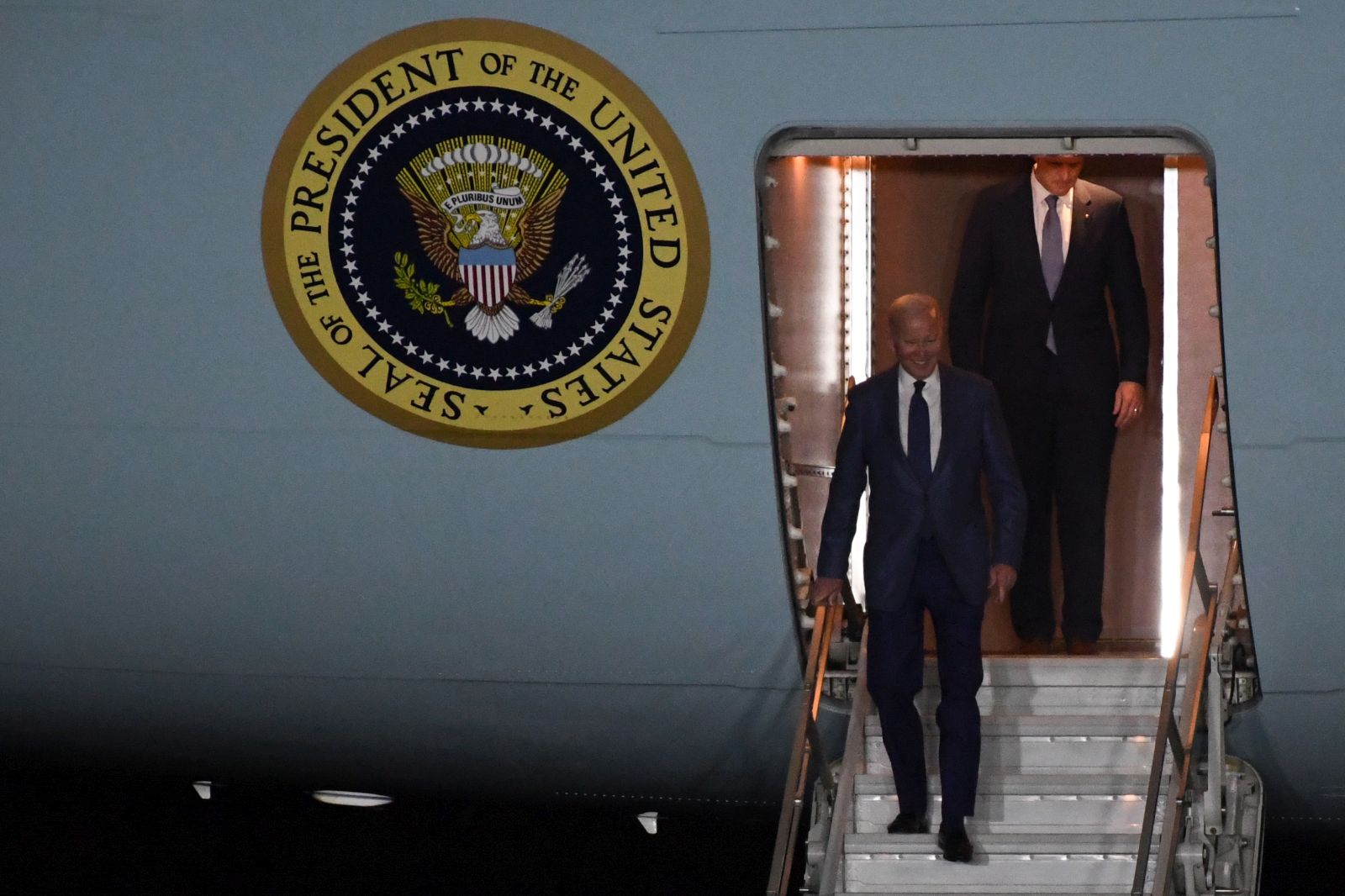 epa10568938 US President Joe Biden (C) disembarks the 'Air Force One' as he arrives at Aldergrove airport in Crumlin, Northern Ireland, Britain, 11 April 2023. Biden will mark the 25th anniversary of the Good Friday Agreement, which largely brought about an end to decades of sectarian violence in Northern Ireland, and celebrate the recent Brexit deal intended to preserve that pact.  EPA/Chris J. Ratcliffe / POOL