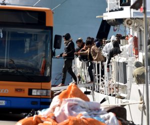 epa10576657 Migrants enter a bus as they disembark from the Italian Coast Guard vessel Peluso in the port of Catania, Sicily Island, southern Italy, 17 April 2023. The Peluso ship arrived in the port of Catania carrying 201 of approximately 600 migrants rescued the day earlier in Maltese search and rescue (SAR) waters, some 170 miles south of the coast of Sicily. Sicily Governor Renato Schifani denounced on 17 April the emergency situation on the island region as the arrival of migrants and refugees by sea put pressure to Sicily and other parts of the country.  EPA/ORIETTA SCARDINO