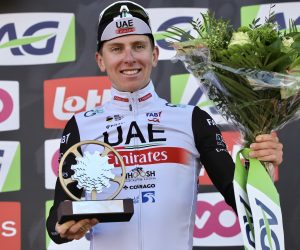 epa10580236 Slovenian rider Tadej Pogacar of UAE Team Emirates celebrates on the podium after winning the Fleche Wallonne cycling race over 194.2km from Herve to Huy, Belgium, 19 April 2023.  EPA/OLIVIER MATTHYS