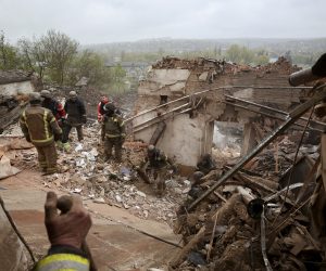 epa10591018 Ukrainian rescuers remove debris after a rocket attack on the local history museum in the city of Kupiansk, Kharkiv region, northeastern Ukraine, 25 April 2023, amid Russia's invasion. At least two persons were killed and 10 others injured in the attack, the State Emergency Service of Ukraine reported. Russian troops entered Ukrainian territory in February 2022, starting a conflict that has provoked destruction and a humanitarian crisis.  EPA/STRINGER