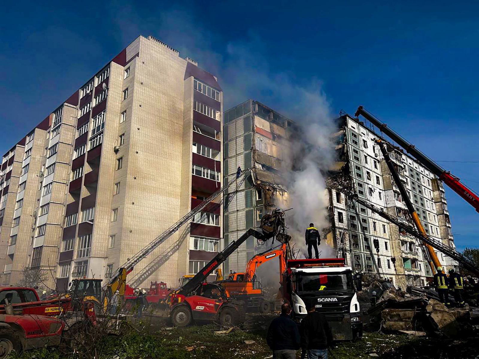 epa10595900 A handout photo released by Ukraine's Ministry of Internal Affairs (MIA) shows rescuers working at the site of a damaged residential building after a missile attack, in Uman, Cherkasy region, central Ukraine, 28 April 2023, amid Russia's invasion. Ukraine's Ministry of Internal Affairs said on 28 April, that the Russian army conducted attacks on residential buildings across the country, including Dnipro, Uman and Ukrainka in the Kyiv region, killing at least six people and injuring several others. Russian troops entered Ukrainian territory in February 2022, starting a conflict that has provoked destruction and a humanitarian crisis.  EPA/UKRAINE'S MINISTRY OF INTERNAL AFFAIRS HANDOUT -- BEST QUALITY AVAILABLE -- MANDATORY CREDIT -- HANDOUT EDITORIAL USE ONLY/NO SALES