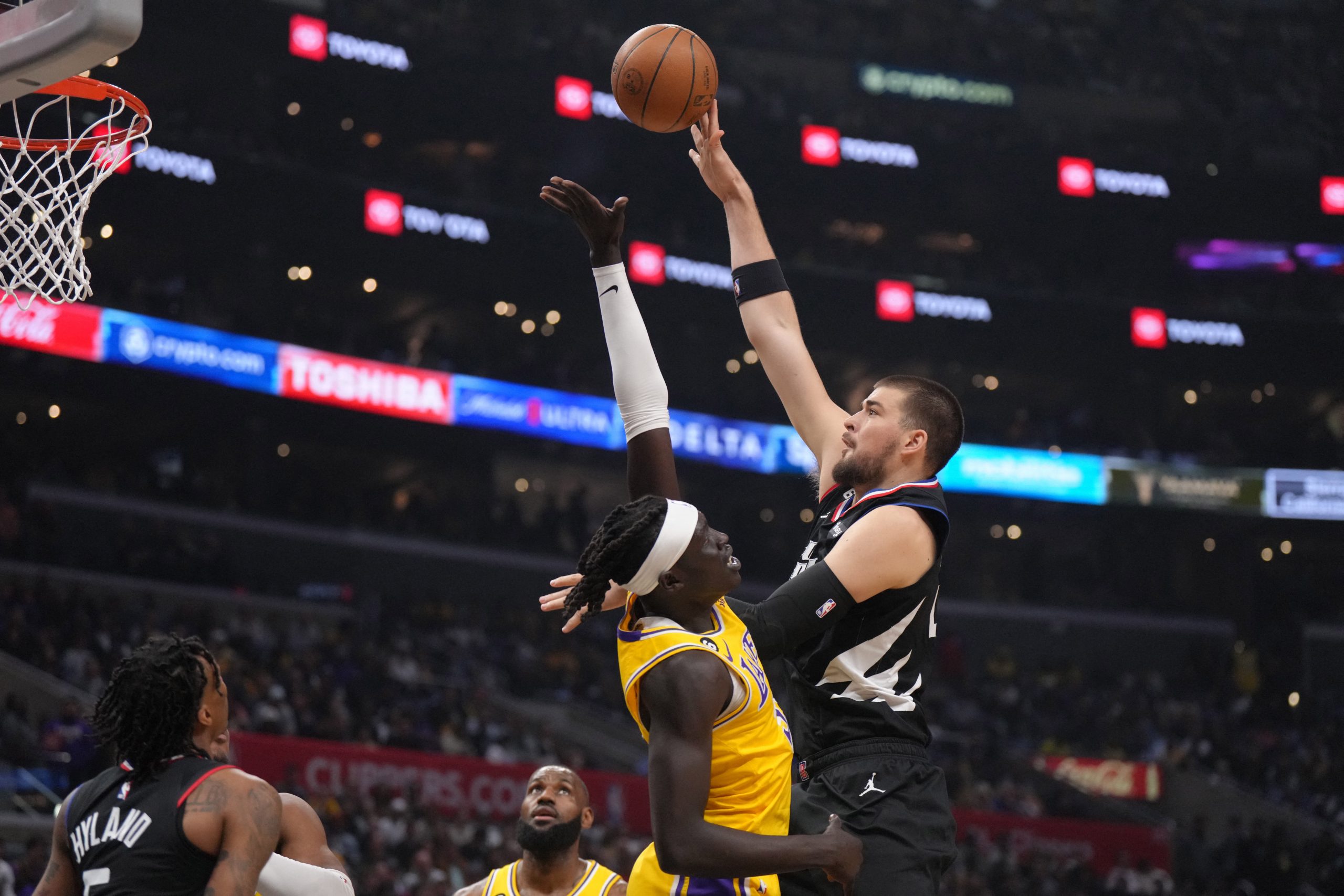 Apr 5, 2023; Los Angeles, California, USA; LA Clippers center Ivica Zubac (40) shoots the ball against Los Angeles Lakers forward Wenyen Gabriel (35) in the first half at Crypto.com Arena. Mandatory Credit: Kirby Lee-USA TODAY Sports Photo: Kirby Lee/REUTERS