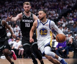 Apr 15, 2023; Sacramento, California, USA; Golden State Warriors guard Stephen Curry (30) dribbles past Sacramento Kings forward Domantas Sabonis (10) in the third quarter during game one of the 2023 NBA playoffs at the Golden 1 Center. Mandatory Credit: Cary Edmondson-USA TODAY Sports Photo: Cary Edmondson/REUTERS