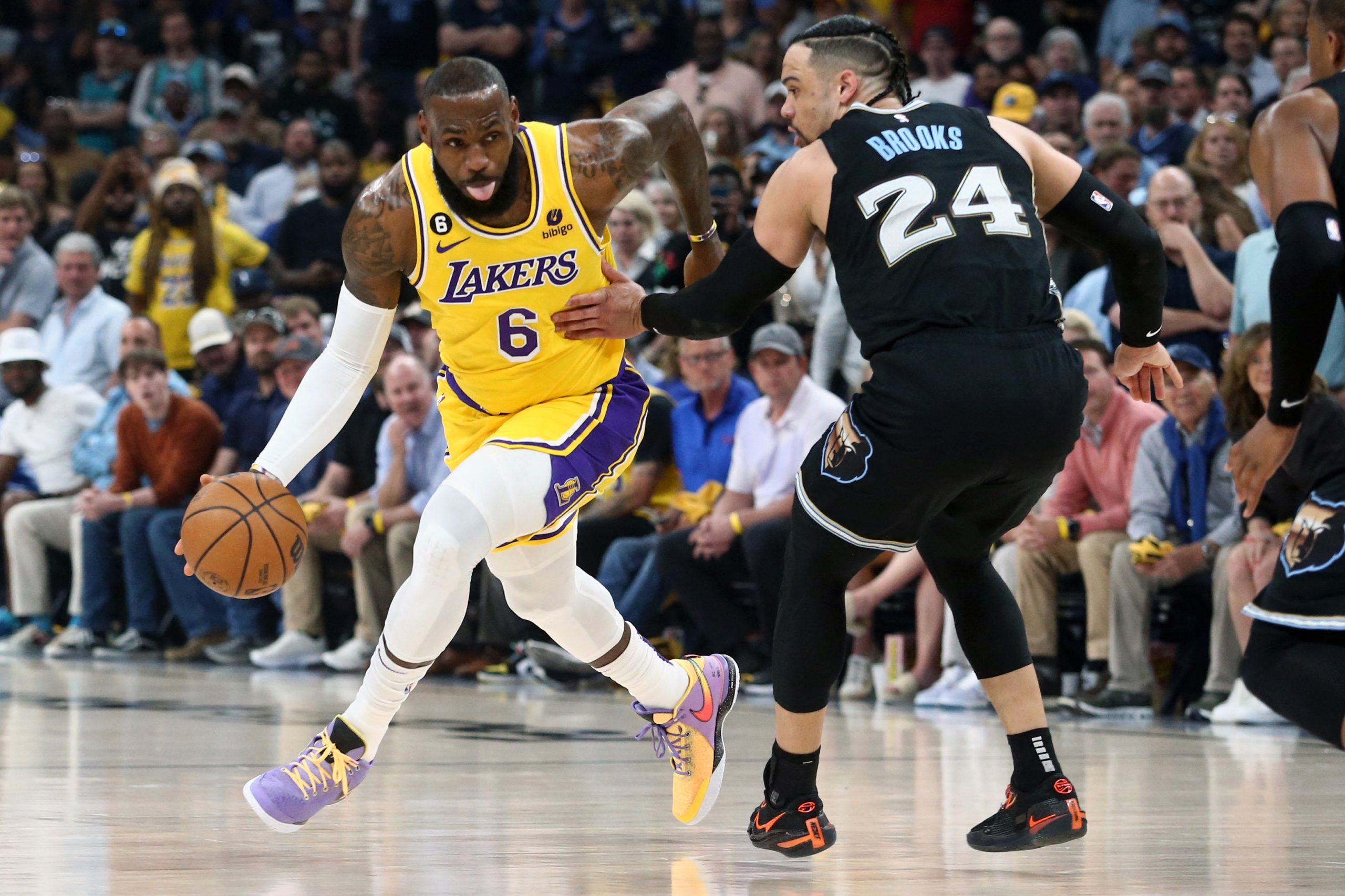 Apr 19, 2023; Memphis, Tennessee, USA; Los Angeles Lakers forward LeBron James (6) dribbles as Memphis Grizzlies forward Dillon Brooks (24) defends during the first half of game two of the 2023 NBA playoffs at FedExForum. Mandatory Credit: Petre Thomas-USA TODAY Sports Photo: Petre Thomas/REUTERS