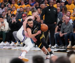 Apr 20, 2023; San Francisco, California, USA; Golden State Warriors guard Stephen Curry (30) dribbles the ball next to Sacramento Kings forward Domantas Sabonis (10) in the third quarter during game three of the 2023 NBA playoffs at the Chase Center. Mandatory Credit: Cary Edmondson-USA TODAY Sports Photo: Cary Edmondson/REUTERS