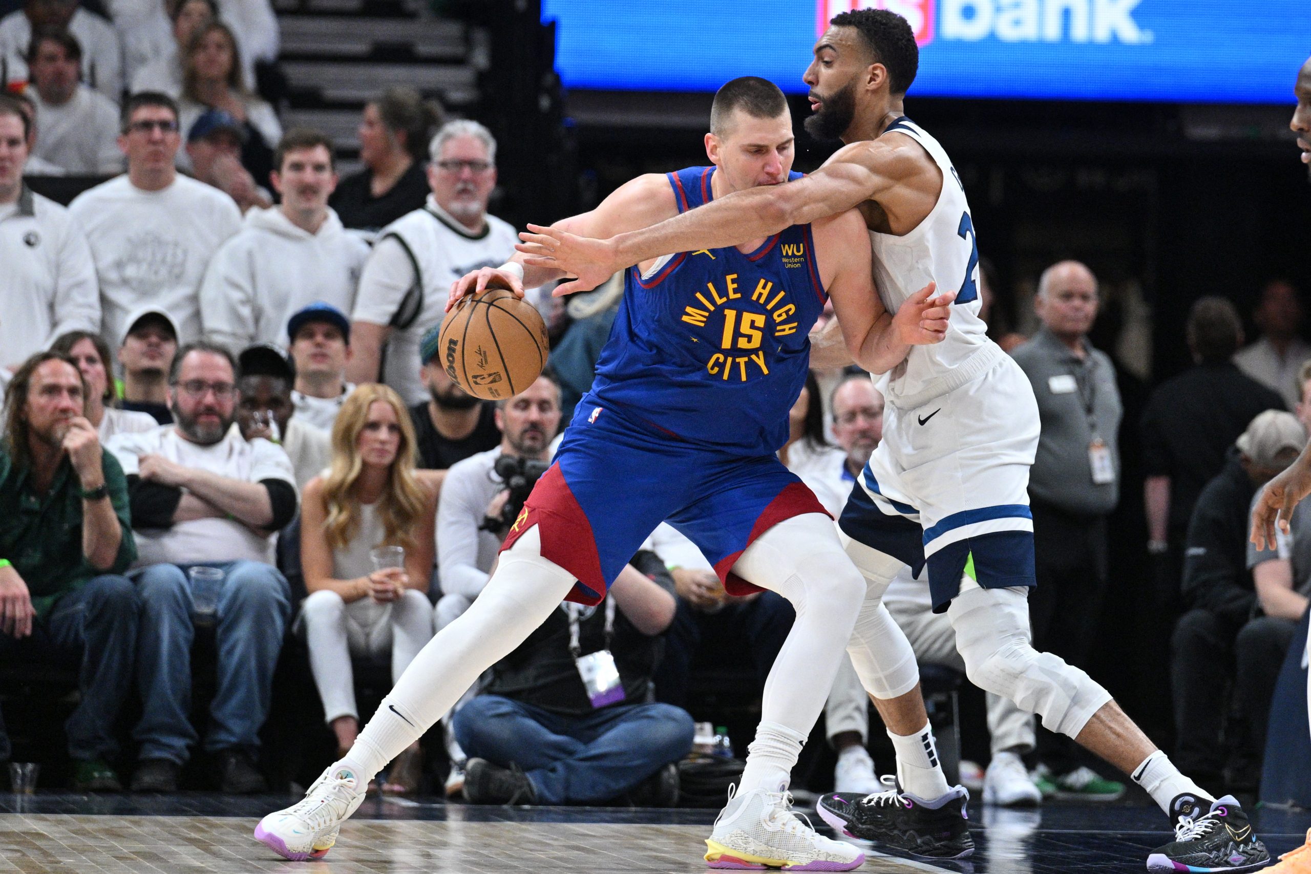 Apr 21, 2023; Minneapolis, Minnesota, USA; Denver Nuggets center Nikola Jokic (15) is defended by Minnesota Timberwolves center Rudy Gobert (27) during the fourth quarter of game three of the 2023 NBA Playoffs at Target Center. Mandatory Credit: Jeffrey Becker-USA TODAY Sports Photo: Jeffrey Becker/REUTERS