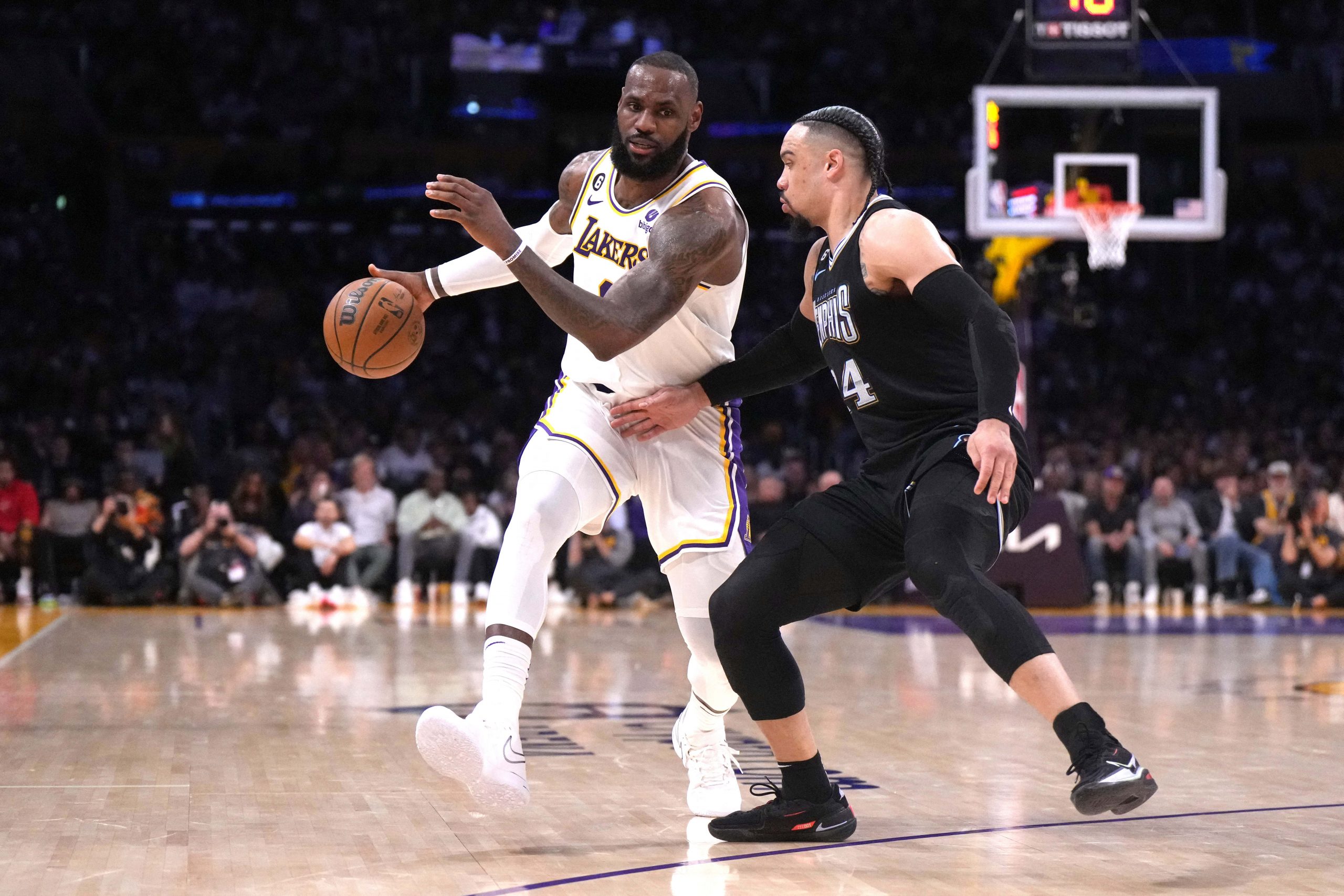 Apr 22, 2023; Los Angeles, California, USA; Los Angeles Lakers forward LeBron James (6) dribbles the ball against Memphis Grizzlies forward Dillon Brooks (24) in the second quarter during game three of the 2023 NBA playoffs at Crypto.com Arena. Mandatory Credit: Kirby Lee-USA TODAY Sports Photo: Kirby Lee/REUTERS