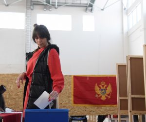 epa10532141 A woman casts her ballot during the first round of the Presidential elections in Podgorica, Montenegro, 19 March 2023. Some 540,000 eligible voters are casting their ballots to chose the next President of Montenegro.  EPA/BORIS PEJOVIC