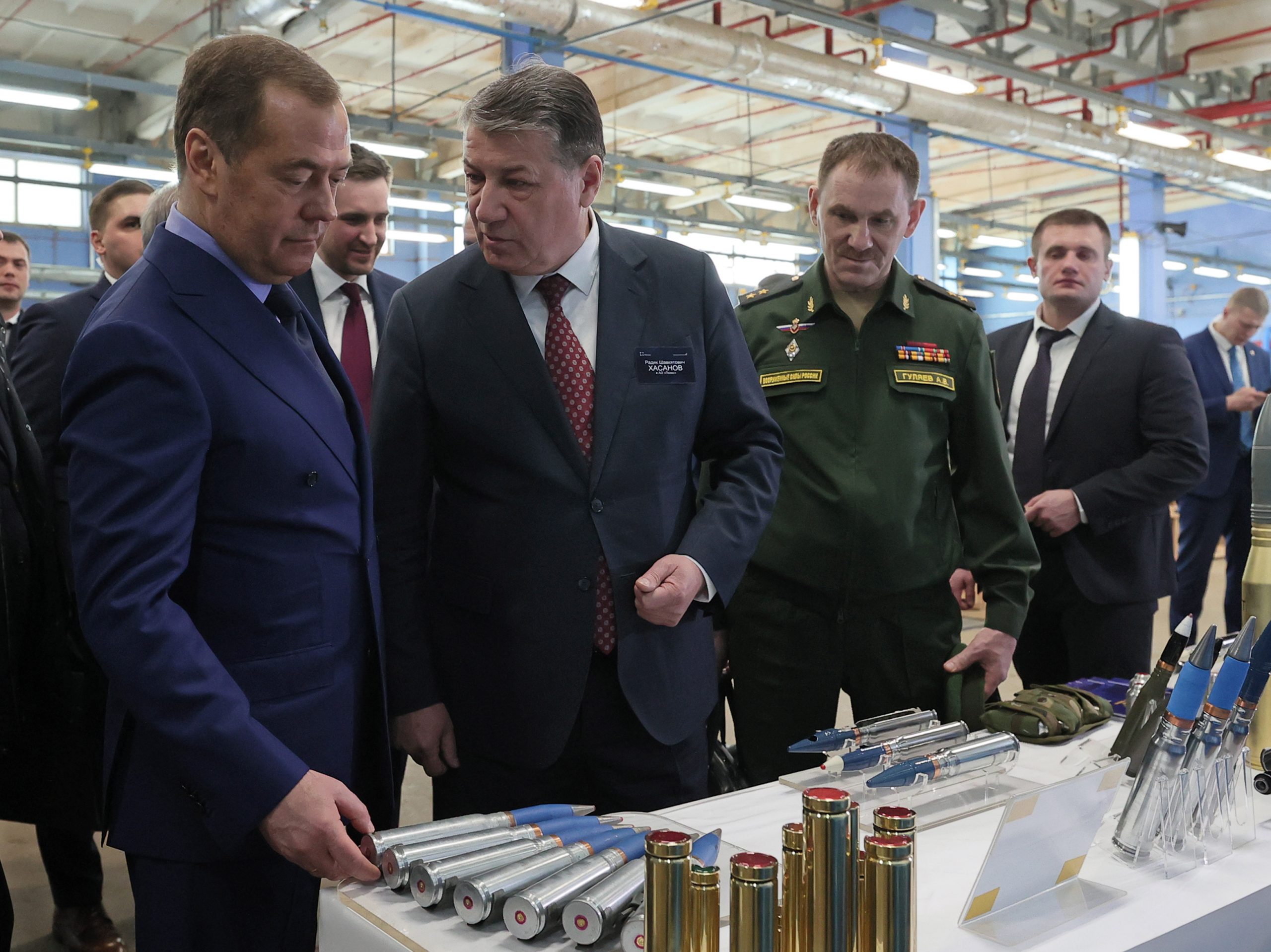 epa10549148 Deputy head of Russia's Security Council Dmitry Medvedev (L) visits a weapons factory in Tatarstan, Russia, 29 March 2023.  EPA/EKATERINA SHTUKINA /SPUTNIK/GOVERNMENT PRESS SERVICE POOL MANDATORY CREDIT