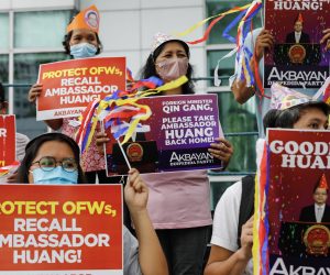 epa10583474 Protesters hold send-off party themed signs calling for the recall of Chinese Ambassador to the Philippines Huang Xilian, during a rally outside the Chinese Consulate in Makati City, Metro Manila, Philippines, 21 April 2023. Protesters asked visiting Chinese Foreign Minister Qin Gang to work on recalling Huang Xilian, following statements made by the ambassador advising the Philippines to oppose Taiwan independence.  EPA/ROLEX DELA PENA