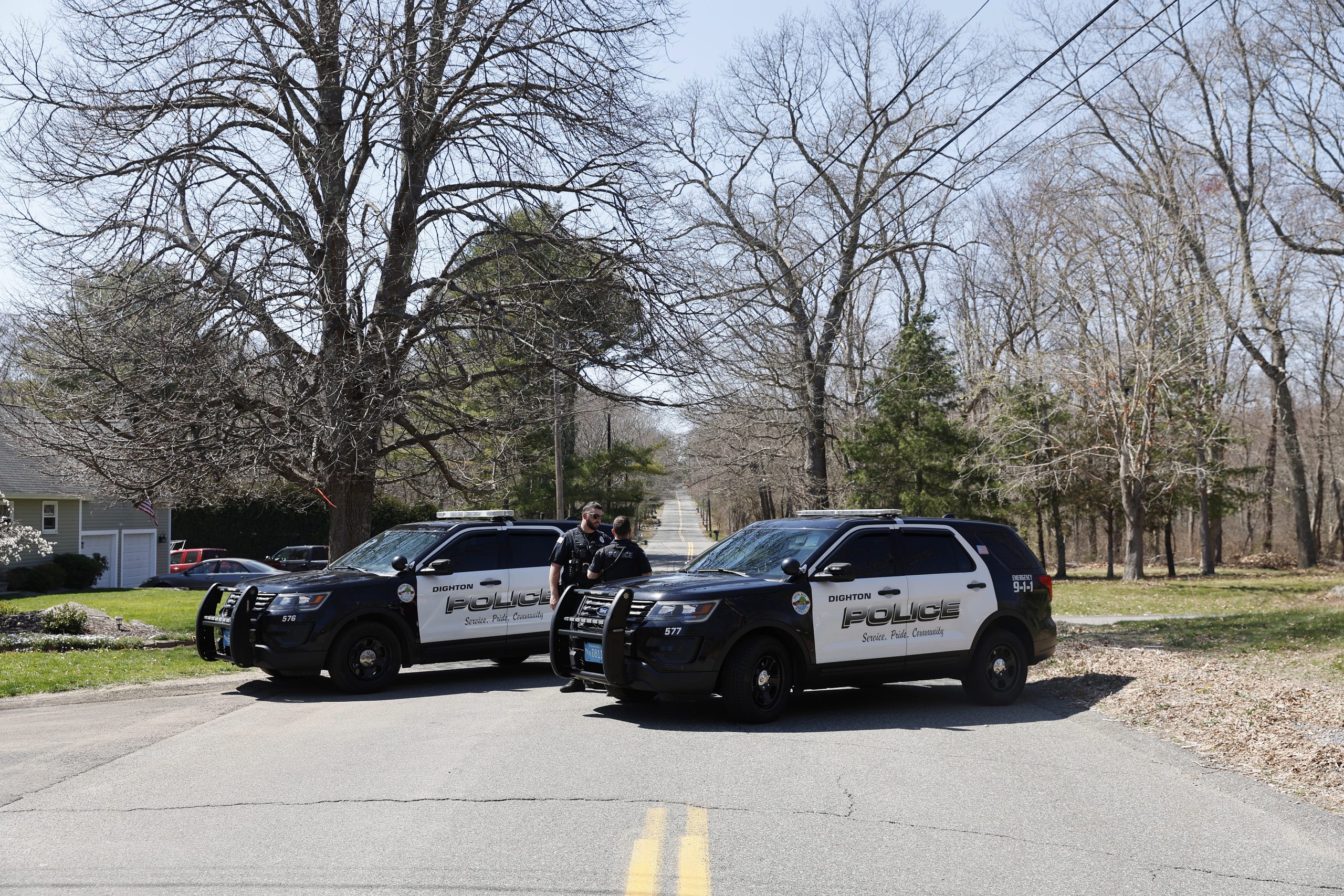 epa10571320 Members of the Dighton Police Department block a road on which the alleged suspect in a US intelligence leak lives in Dighton, Massachusetts, USA, 13 April 2023. US President Biden earlier in the day stated that investigators in the intelligence community and the Justice Department were closing in as part of an investigation in to the documents which were leaked online starting in March 2023.  EPA/CJ GUNTHER