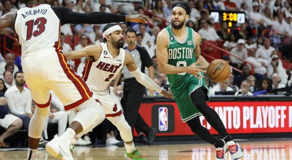 May 27, 2023; Miami, Florida, USA; Boston Celtics guard Derrick White (9) controls the ball against Miami Heat guard Gabe Vincent (2) in the fourth quarter during game six of the Eastern Conference Finals for the 2023 NBA playoffs at Kaseya Center. Mandatory Credit: Sam Navarro-USA TODAY Sports
