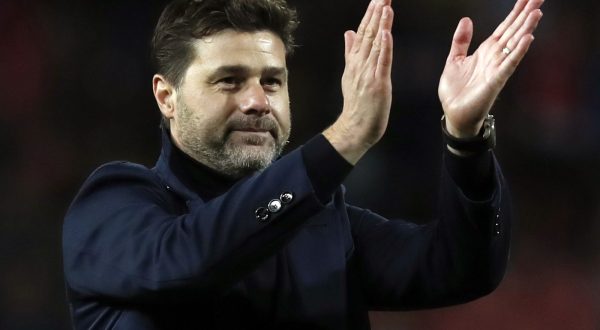 FILE - Mauricio Pochettino applauds fans after the Champions League group B soccer match between Red Star and Tottenham, at the Rajko Mitic Stadium in Belgrade, Serbia, Wednesday, Nov. 6, 2019. Chelsea has hired Mauricio Pochettino as manager on a two-year deal with the option of another year. The Argentine coach is tasked with getting the best out of an expensively assembled squad that has underperformed at the start of a new era for the English club. (AP Photo/Darko Vojinovic, File)