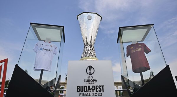 The UEFA Europa League Trophy is displayed in the Fan Zone at Heroes Square in Budapest, Hungary, Tuesday, May 30, 2023 one day before of UEFA Europa League final soccer match between Spanish club FC Sevilla and Italian club AS Roma in Budapest on Wednesday, May 31, 2023. (Marton Monus/MTI via AP)