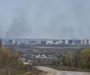 epa10567767 A general view on Bahkmut with smoke coming from the city in Bakhmut, Donetsk region, Ukraine, 10 April 2023. Russian troops entered Ukrainian territory on 24 February 2022, starting a conflict that has provoked destruction and a humanitarian crisis.  EPA/OLEG PETRASYUK