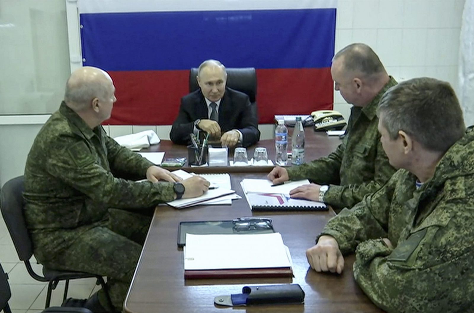 epa10577971 A handout image provided by the Kremlin.ru shows Russian President Vladimir Putin (C) visiting the headquarters of the ‘Dnieper’ army group in the Kherson Region, 18 April 2023. Putin made working trips to the headquarters of the Dnieper grouping of troops in the Kherson direction and to the headquarters of the Vostok National Guard in the Luhansk People's Republic.  EPA/KREMLIN.RU/HANDOUT HANDOUT EDITORIAL USE ONLY/NO SALES HANDOUT EDITORIAL USE ONLY/NO SALES