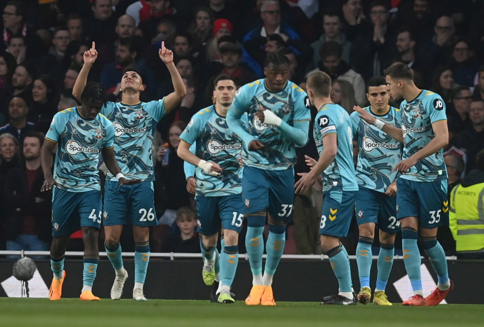 epa10584449 Southampton's players react after Carlos Alcaraz scores his team's first goal during the English Premier League soccer match between Arsenal and Southampton at the Emirates Stadium in London, Britain, 21 April 2023.  EPA/NEIL HALL