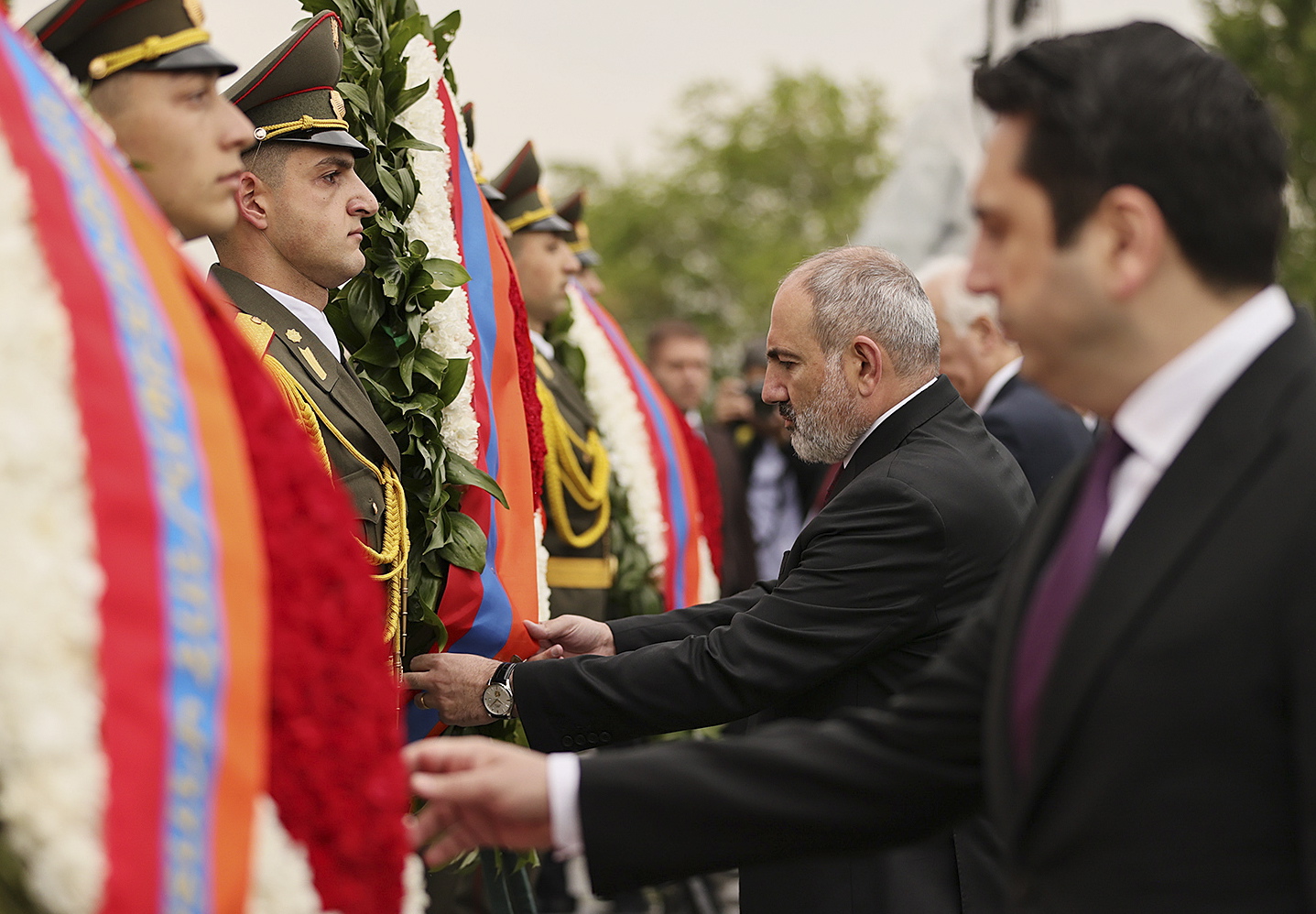 epa10589193 A handout photo made available by the Armenian Prime Minister press service shows Armenian Prime Minister Nikol Pashinyan (C) laying a wreath to commemorate the victims of the Armenian Genocide at the Tsitsernakaberd Armenian Genocide Memorial complex in Yerevan, Armenia, 24 April 2023. Armenia marks the 108th anniversary of the Armenian Genocide in which some 1.5 million Armenians were killed in 1915.  EPA/ARMENIAN PRIME MINISTER PRESS SERVICE HANDOUT  HANDOUT EDITORIAL USE ONLY/NO SALES