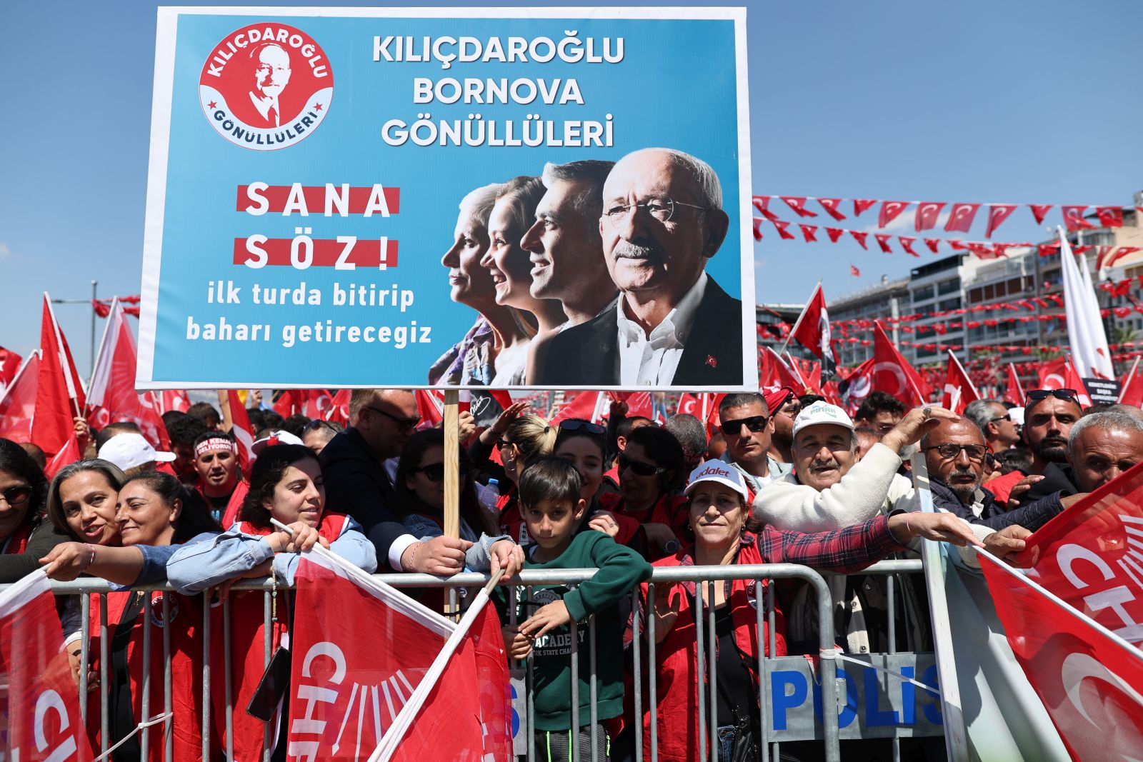 epa10599716 Supporters of Turkish presidential candidate Kemal Kilicdaroglu, leader of the opposition Republican People's Party (CHP), hold Turkish flags and shout slogans during his election campaign rally in lzmir, Turkey, 30 April 2023. General elections will be held in Turkey on 14 May 2023 with a two-round voting to elect the president of Turkey and the parliamentary elections will be held simultaneously to elect the members of the Grand National Assembly of Turkey.  EPA/TOLGA BOZOGLU