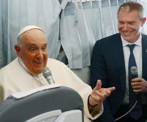 epa10600942 Pope Francis (L) answers to reporters' questions during a conference aboard the papal plane on his flight back to Rome after visiting Hungary, 30 April 2023. Pope Francis had paid an Apostolic visit to Hungary from 28 to 30 April 2023.  EPA/Vincenzo PINTO / POOL