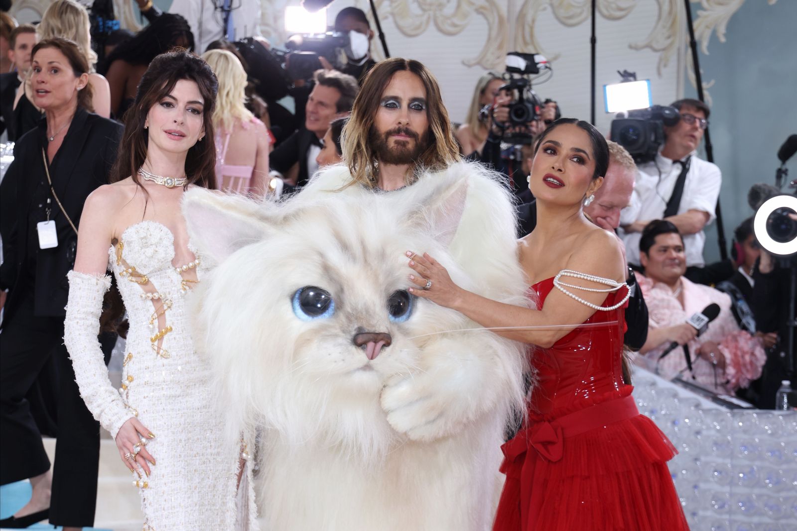 epa10603324 US Actor Anne Hathaway (L) US actor Jared Leto (C) and Mexican-American actor Salma Hayek (R) arrive on the carpet for the 2023 Met Gala, the annual benefit for the Metropolitan Museum of Art's Costume Institute, in New York, New York, USA, 01 May 2023. The theme of this year's event is the Met Costume Institute's exhibition, 'Karl Lagerfeld: A Line of Beauty.'  EPA/JUSTIN LANE