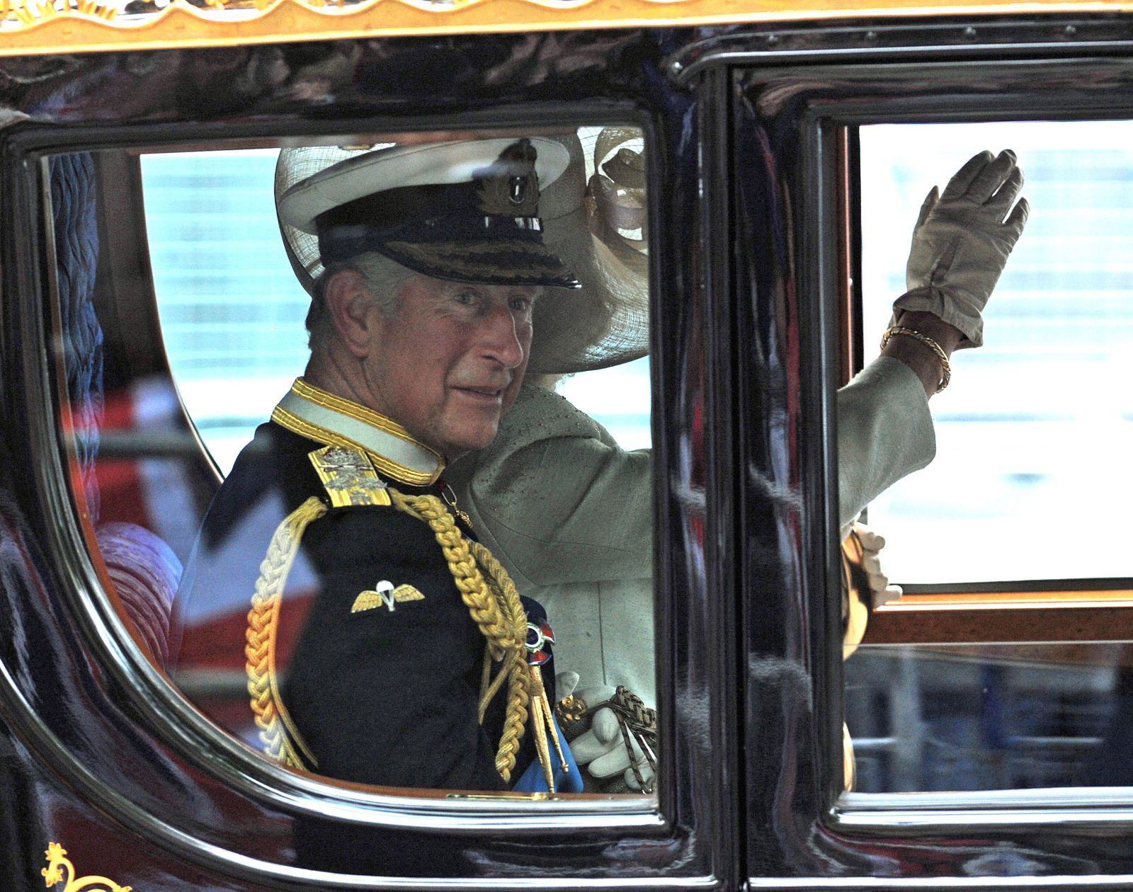 epa10610049 (FILE) - Britain's Prince Charles of Wales (L) and wife Camilla, the Duchess of Cornwall, wave as they proceed along Whitehall, after the marriage of Prince William and Kate Middleton at Westminster Abbey, in London, Britain, 29 April 2011 (reissued 05 May 2023). Britain's King Charles III's Coronation will take place at Westminster Abbey in London on 06 May 2023. The King will be crowned alongside Camilla, the Queen Consort.  EPA/GERRY PENNY *** Local Caption *** 00000402636386