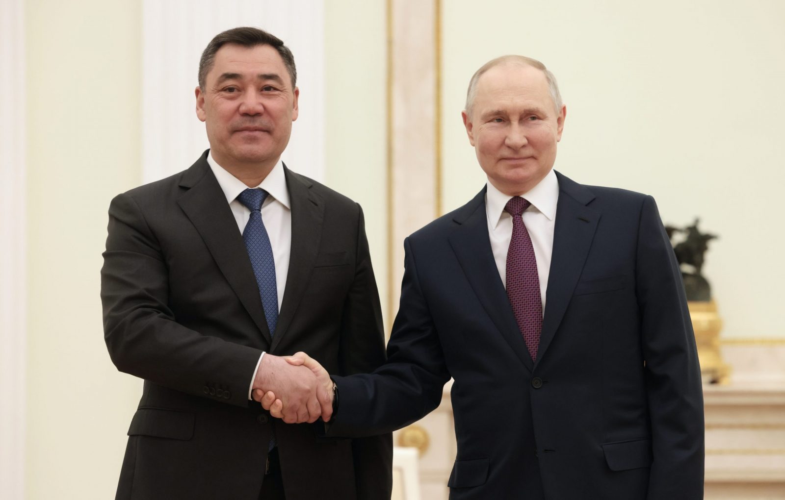epa10615338 Russian President Vladimir Putin (R) shakes hands with Kyrgyz President Sadyr Japarov during their meeting at the Moscow Kremlin in Moscow, Russia 08 May 2023. The leaders of the countries of the former USSR - Kazakhstan, Kyrgyzstan, Armenia and Tajikistan will take part in the events on 09 May dedicated to Victory Day in Moscow.  EPA/SPUTNIK/ KREMLIN POOL MANDATORY CREDIT