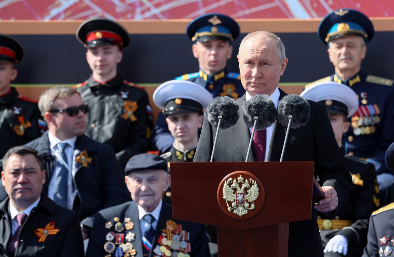 epa10616675 Russian President Vladimir Putin (C) delivers his speech during a Victory Day military parade on Red Square in Moscow, Russia, 09 May 2023. Russia marks the 78th anniversary of the victory in World War II over Nazi Germany and its allies. The Soviet Union lost 27 million people in the war.  EPA/GAVRIIL GRIGOROV / SPUTNIK / KREMLIN POOL MANDATORY CREDIT