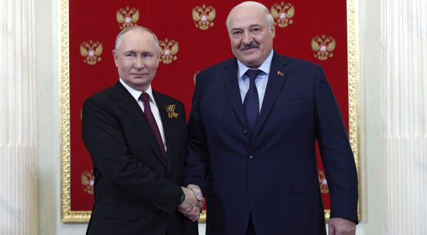 epa10616943 Russian President Vladimir Putin (L) shakes hands with Belarus President Alexander Lukashenko (R) during their meeting at the Kremlin before a Victory Day military parade on Red Square in Moscow, Russia, 09 May 2023. Russia marks the 78th anniversary of the victory in World War II over Nazi Germany and its allies. The Soviet Union lost 27 million people in the war.  EPA/VLADIMIR SMIRNOV / SPUTNIK / KREMLIN POOL MANDATORY CREDIT