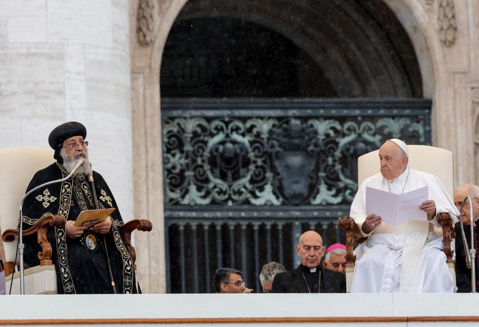 epa10618620 Pope Francis listens as Pope Tawadros II of Alexandria (L) addresses the weekly general audience in Saint Peter's Square, at the Vatican City, 10 May 2023.  EPA/GIUSEPPE LAMI