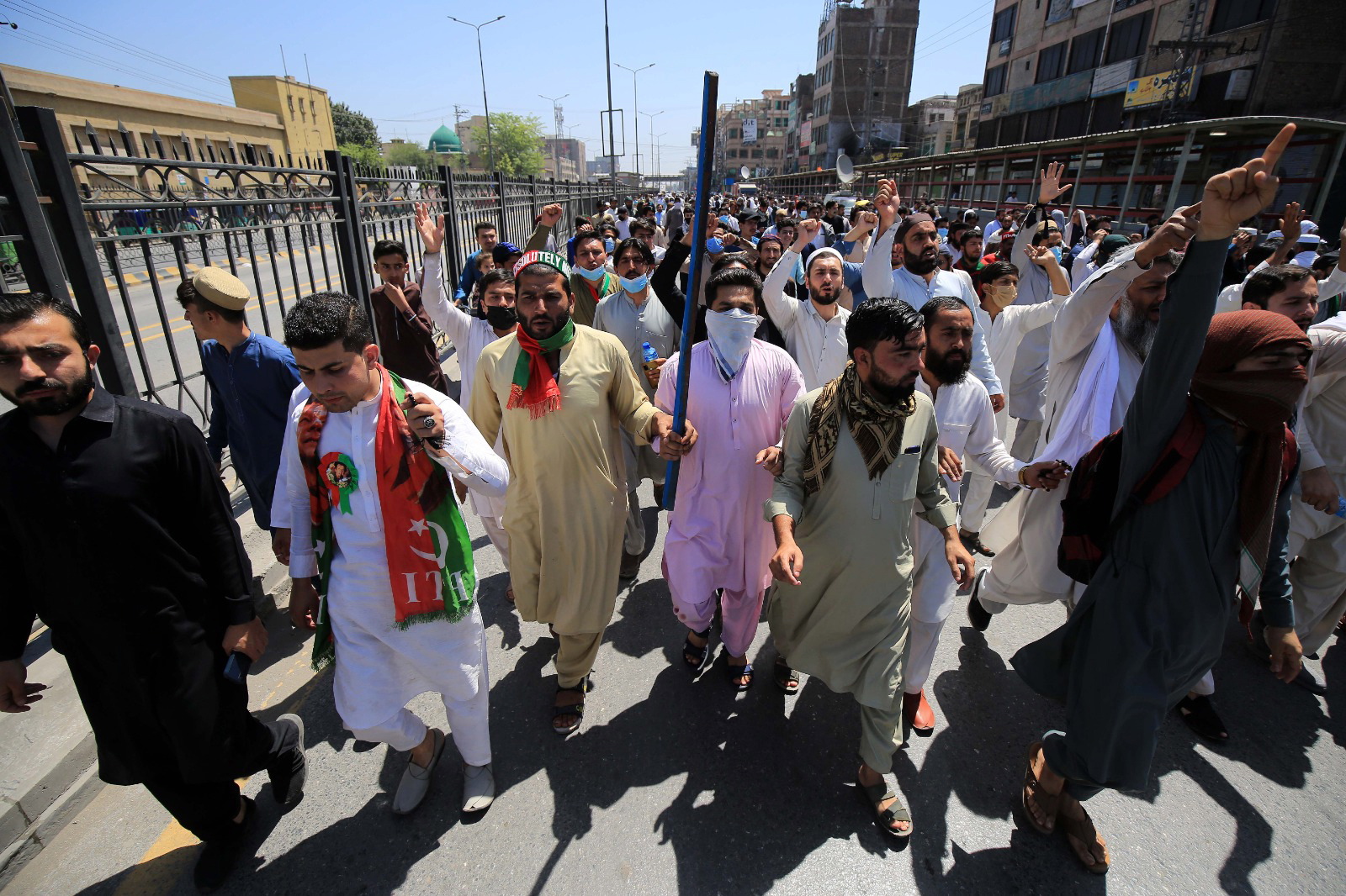 epa10618841 Supporters of Pakistan's former Prime Minister Imran Khan rally following the arrest of the head of the opposition party Pakistan Tehrik-e-Insaf, in Peshawar, Pakistan, 10 May 2023. At least four people died and dozens more were injured on 09 May in disturbances across Pakistan following the arrest of former prime minister Khan, spokespeople for his PTI party said. The government shut down Twitter, Facebook, and YouTube in much of the country, blocking both the internet and mobile data. Authorities suspended the right of assembly in the capital Islamabad and throughout Khan's native province of Punjab. Pakistan Rangers, a paramilitary law enforcement corps, on 09 May apprehended former Prime Minister, Imran Khan, while he was attending a bail hearing in court in Islamabad. Khan, who had been ousted from his position as prime minister by parliament in a vote of no-confidence, is currently facing multiple charges of corruption and terrorism.  EPA/BILAWAL ARBAB