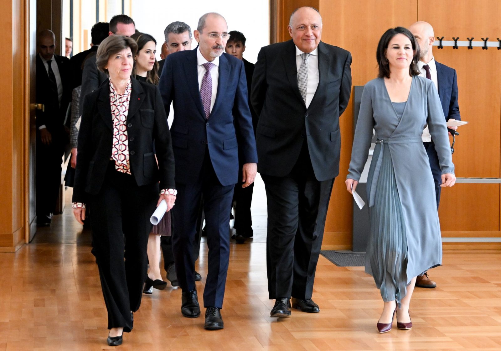 epa10620703 German Foreign Minister Annalena Baerbock (R) arrives with her counterparts France's Catherine Colonna (L), Egypt's Sameh Shoukry (2-R) and Jordan's Ayman Safadi for a news conference after a ministerial meeting of the Munich Group on the Middle East peace process, at the federal foreign ministry in Berlin, Germany, 11 May 2023.  EPA/Filip Singer