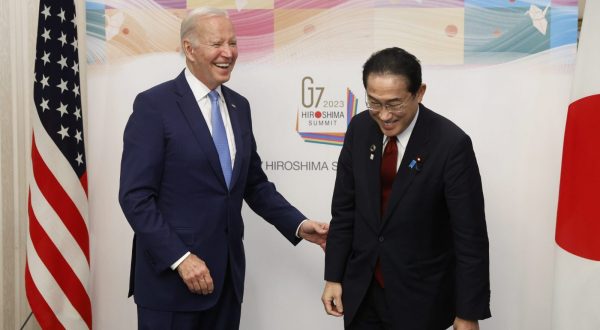 epa10635956 US President Joe Biden (L) and Japan's prime Minister Fumio Kishida (R) react prior to a bilateral meeting ahead of the G7 Hiroshima Summit in Hiroshima, Japan, 18 May 2023. The G7 Hiroshima Summit will be held from 19 to 21 May 2023.  EPA/Kiyoshi Ota / POOL