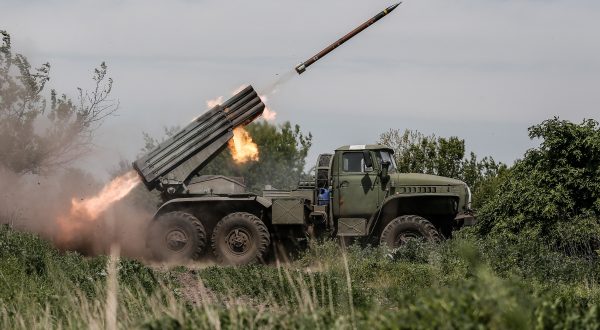 epa10638729 Ukrainian servicemen from the 24th Mechanized Brigade 'King Danylo' fire a BM-21 'Grad' multiple rocket launcher system (MLRS) in the direction of the frontline city of Bakhmut, at an undisclosed location, Donetsk region, eastern Ukraine, 19 May 2023, amid the Russian invasion. The frontline city of Bakhmut, a key target for Russian forces, has seen heavy fighting for months. Russian troops on 24 February 2022, entered Ukrainian territory, starting a conflict that has provoked destruction and a humanitarian crisis.  EPA/OLEG PETRASYUK
