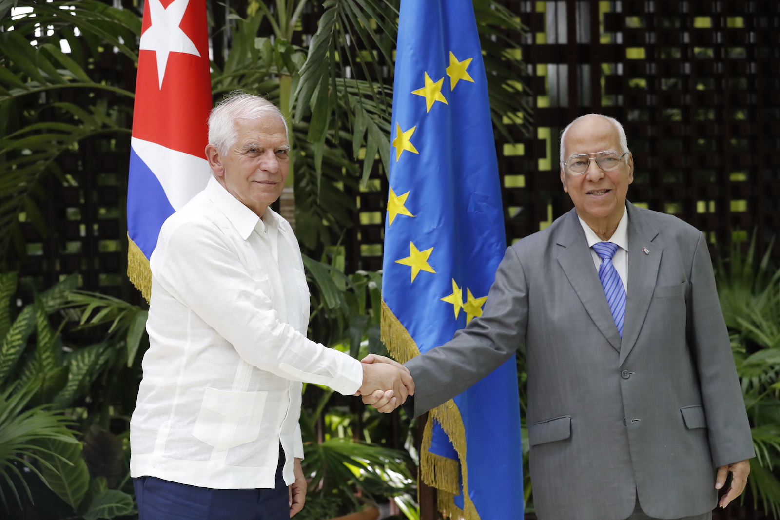 epa10655792 Ricardo Cabrisas (R), Cuban Deputy Prime Minister and Minister of Foreign Trade, receives the High Representative of the European Union (EU) for Foreign Affairs, Josep Borrell (L), upon his arrival at the 3rd Joint Council between the EU and Cuba, in Havana, Cuba, 26 May 2023. Borrell is visiting the island for a bilateral meeting framed in the Political Dialogue and Cooperation Agreement (ADPC) between the EU and Cuba, in force since 2017.  EPA/Ernesto Mastrascusa