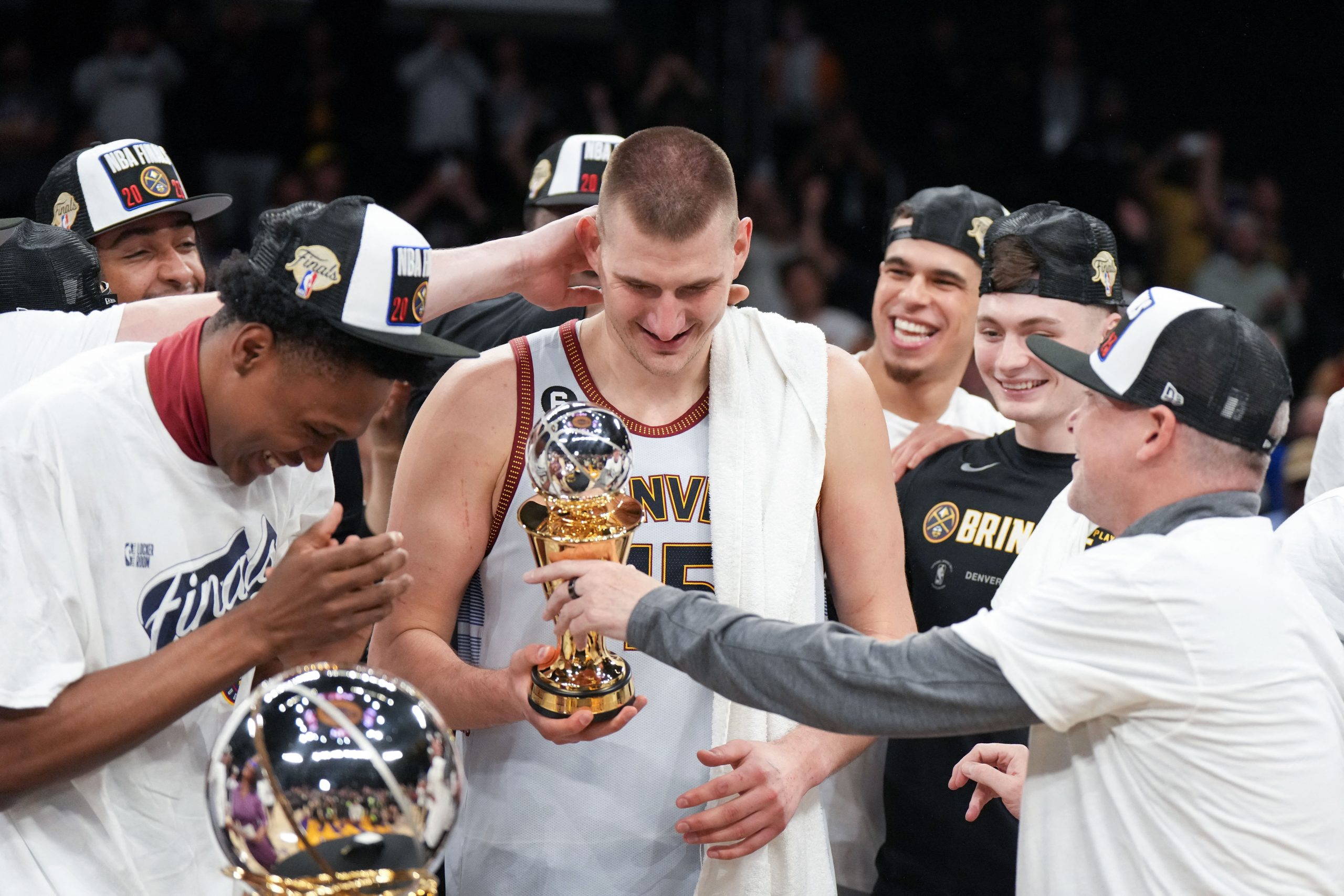 May 22, 2023; Los Angeles, California, USA; Denver Nuggets center Nikola Jokic (15) celebrates winning the Western Conference MVP Trophy and beating the Los Angeles Lakers in game four of the Western Conference Finals for the 2023 NBA playoffs at Crypto.com Arena. Mandatory Credit: Kirby Lee-USA TODAY Sports Photo: Kirby Lee/REUTERS