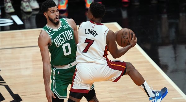 May 23, 2023; Miami, Florida, USA; Miami Heat guard Kyle Lowry (7) controls the ball against Boston Celtics forward Jayson Tatum (0) in the fourth quarter during game four of the Eastern Conference Finals for the 2023 NBA playoffs at Kaseya Center. Mandatory Credit: Jim Rassol-USA TODAY Sports Photo: Jim Rassol/REUTERS