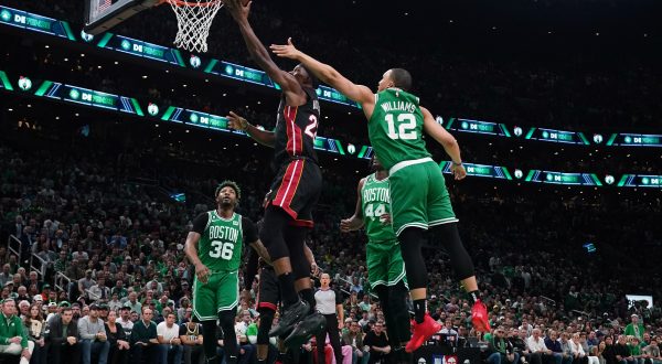 May 29, 2023; Boston, Massachusetts, USA; Miami Heat forward Jimmy Butler (22) shoots against Boston Celtics forward Grant Williams (12) in the first quarter during game seven of the Eastern Conference Finals for the 2023 NBA playoffs at TD Garden. Mandatory Credit: David Butler II-USA TODAY Sports Photo: David Butler II/REUTERS
