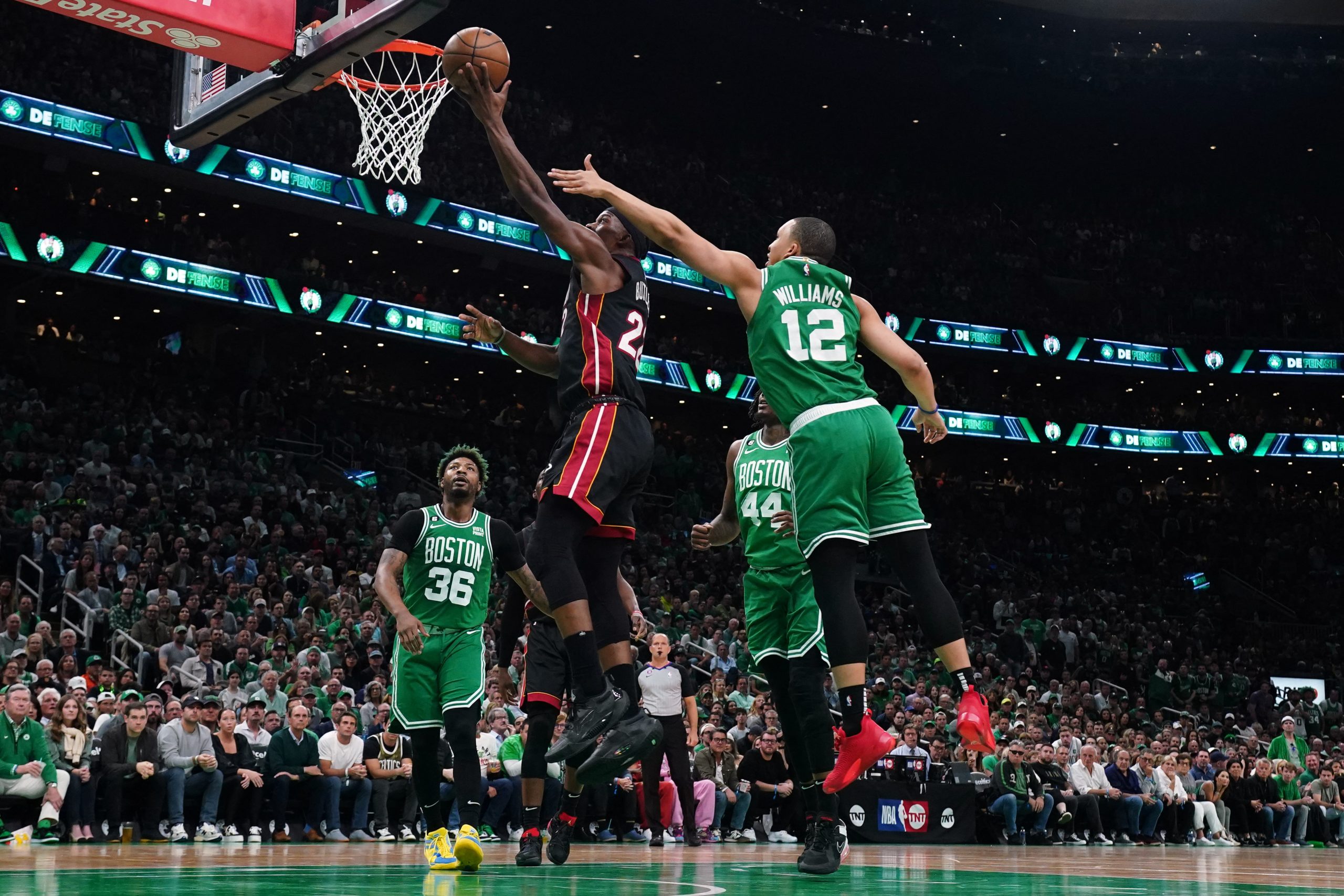 May 29, 2023; Boston, Massachusetts, USA; Miami Heat forward Jimmy Butler (22) shoots against Boston Celtics forward Grant Williams (12) in the first quarter during game seven of the Eastern Conference Finals for the 2023 NBA playoffs at TD Garden. Mandatory Credit: David Butler II-USA TODAY Sports Photo: David Butler II/REUTERS